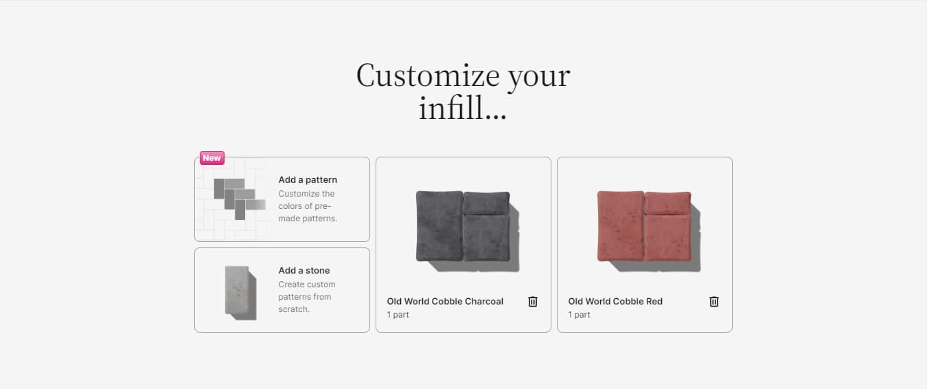 A large driveway paved with neutral-tone concrete pavers.